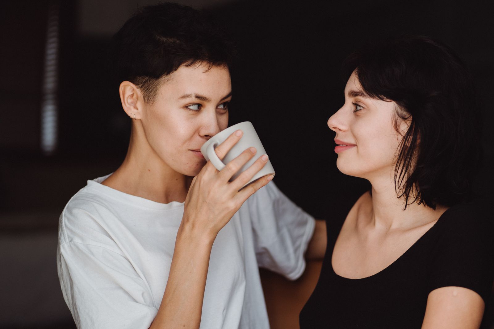 Two women sharing a quiet conversation